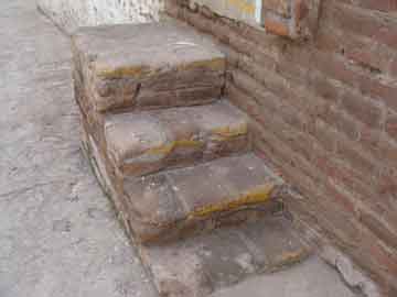 Worn Steps into Leather Factory